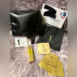 black YSL cosmetics zip bag